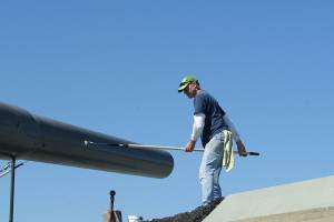 Photos by Maria Matson/Whidbey News Group                                John White of Freeland works to paint the Big Guns at Fort Casey. It was a good day to paint, with the sunshine and fresh air, he said. The work is being done by volunteers in preparation of the 50th anniversary of the Big Guns arrival, which will be held on Aug. 11.