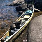 Photo by Jim Christensen                                The rented canoe is hauled ashore at a stopping point.