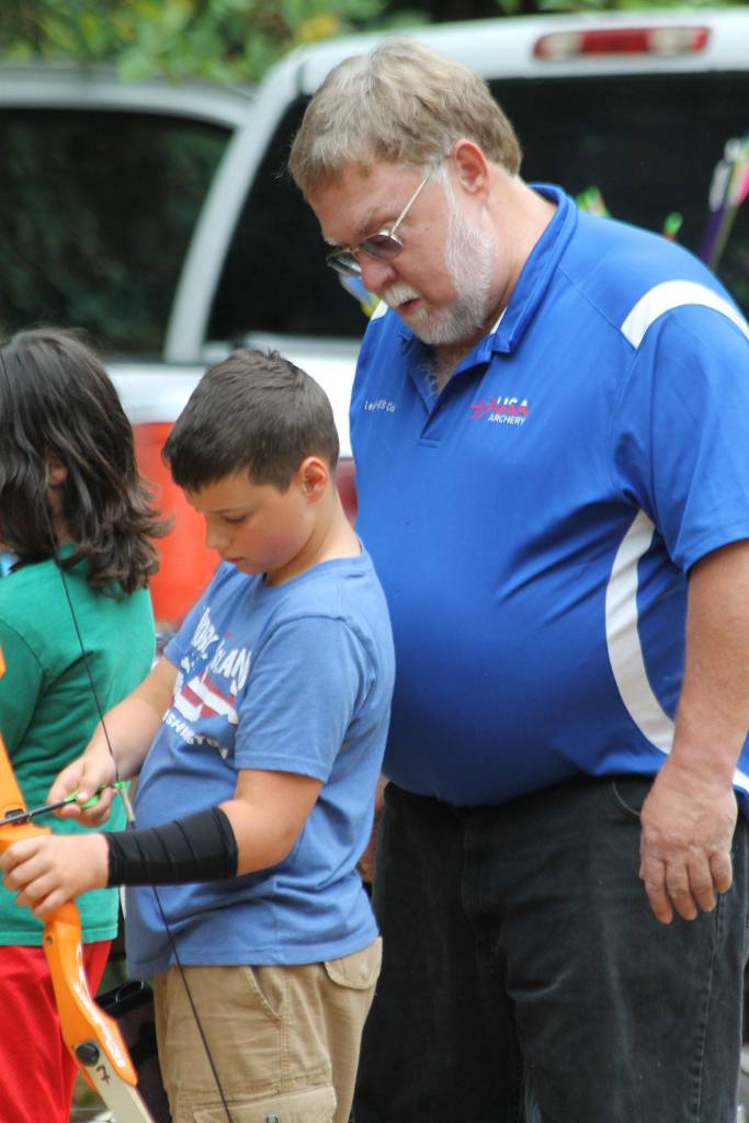 Instructor Bill Stinson helps Ben Cone with his technique.(Photo by Jim Waller/South Whidbey Record)
