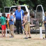 Bill Stinson instructs the group as they begin archery camp last Thursday.(Photo by Jim Waller/South Whidbey Record)