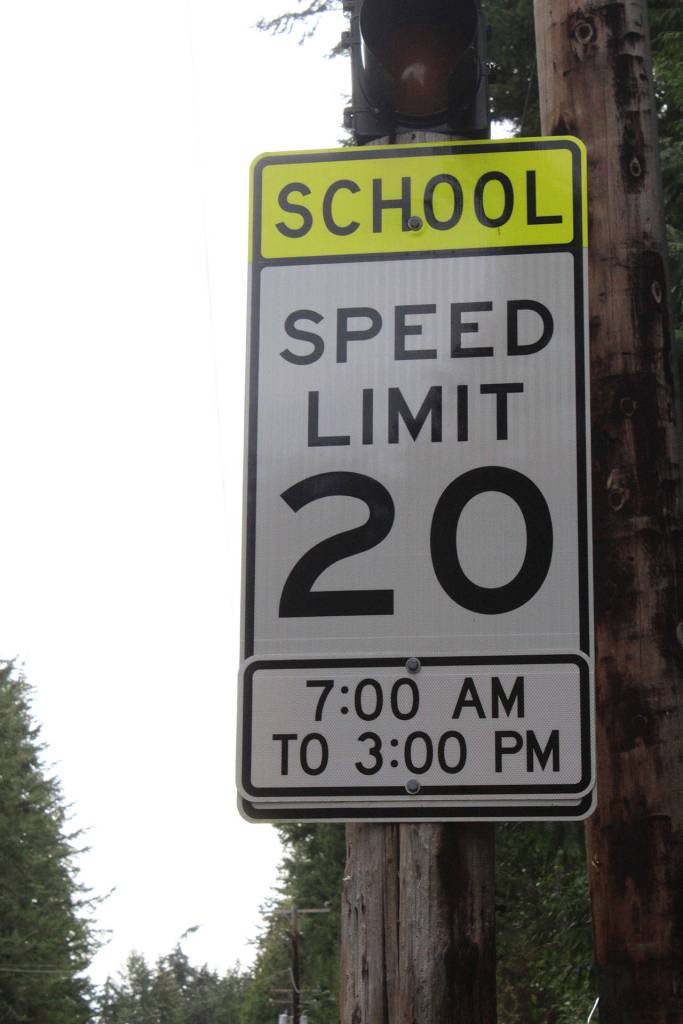 Signs in front of South Whidbey High School display when the 20 mph is enforced 7 a.m. to 3 p.m. However, the yellow blinking warning light was not working Monday.