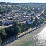 SaratogaAerials.com photo  Seawall Park in Langley may have covered shelters, waterfront seating areas, native plants and a promenade if the city council approves a redesign now being aired to the public.