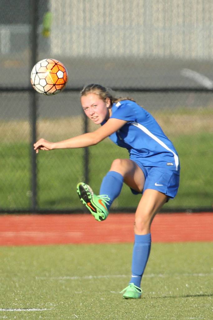 Lila McCleary drives the ball up field.(Photo by John Fisken)