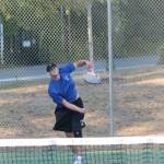Brent Batchelor rockets a serve in Wednesdays match.(Photo by Jim Waller/South Whidbey Record)