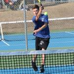 Soren Bratrude volleys against Coupeville.(Photo by Jim Waller/South Whidbey Record)