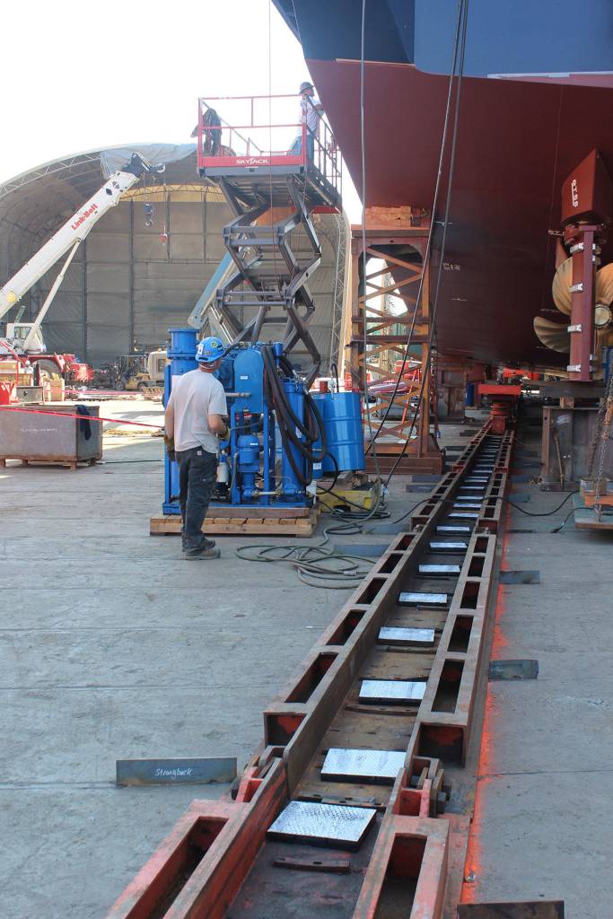 Last year, the Lindblad sister ship named Quest was launched using more than a dozen inflatable bags that rolled the vessel down the ramp and into the water. This ship, named Venture, is lighter so its being moved using a sliding mechanism and two tracks.