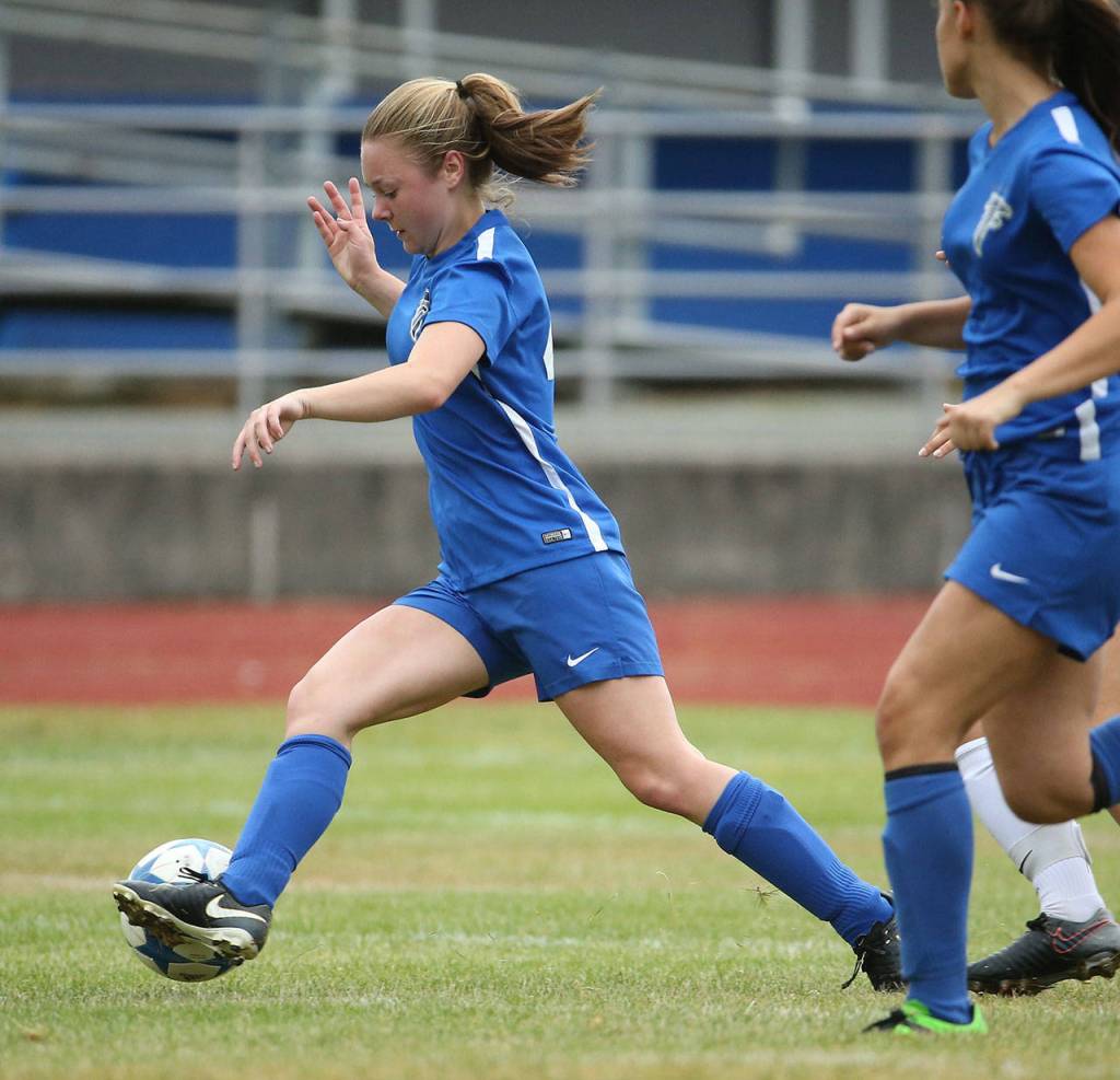 Mallory Drye takes control for South Whidbey.(Photo by John Fisken)