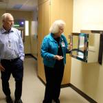 WhidbeyHealth board commissioners Ron Wallin and Nancy Fey look into the sterile chambers for mixing drug compounds in the new hospital pharmacy slated to open soon. (Photo by Patricia Guthrie/Whidbey News Group)