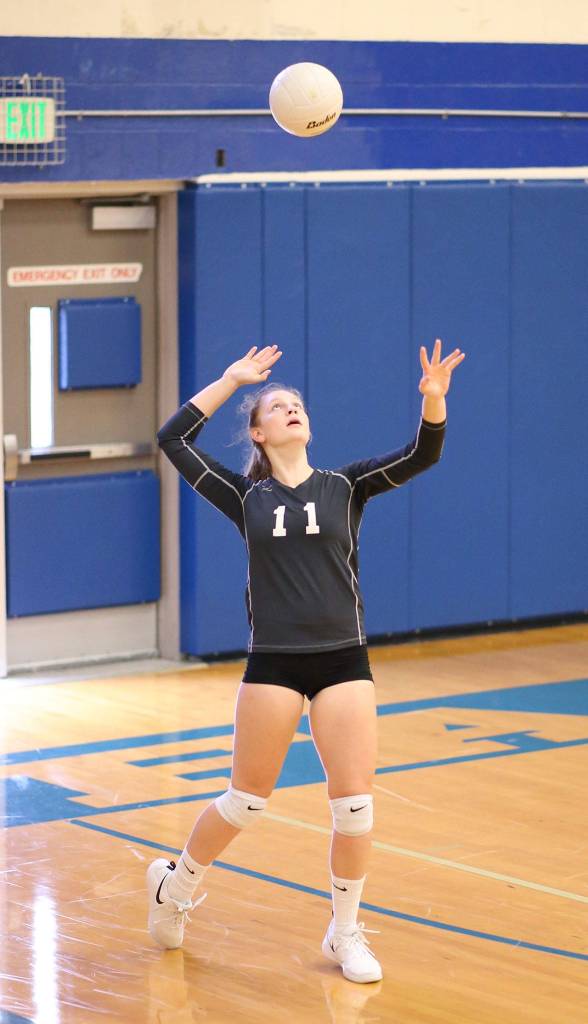 Emma Hodson gets ready to smack a serve Saturday.(Photo by John Fisken)