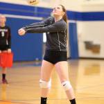 Kayla Knauer passes for the Falcons.(Photo by John Fisken)