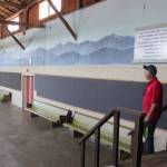 Fairgrounds director Larry Lehtonen walks through the Pole Building, the first facility built for the fair in 1937. A wedding and fundraising event recently took place there. (Photo by Patricia Guthrie/Whidbey News Group)