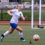 Sydney Ollis runs down the ball for the Falcons in Saturdays match at Oak Harbor.(Photo by John Fisken)