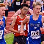 Reilly McVay (1421) and Cooper Ullmann (1427) complete the first of two loops on the Westling course.(Photo by Karen Swegler)