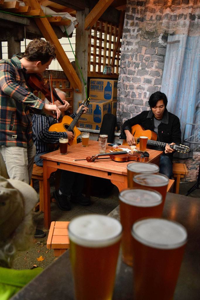 The musicians kept coming and so did the beers bought for them from a grateful listening audience at Double Bluff Brewery Saturday in Langley. (Photo by Patricia Guthrie/Whidbey News Group)