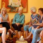 Photo by Joan Soltys                                Healing Circles volunteer hosts, including Diana and Kelly Lindsay (far right) gather to talk about their circles.