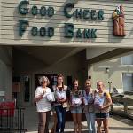 From left are food bank manager Karen Korbelik, Taryn Henny, Freja Heggenes, Abigail Ireland and Parker Forsyth.