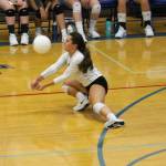 Angelina Wilson digs out a Coupeville serve.(Photo by Jim Waller/South Whidbey Record)