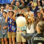 The South Whidbey student section sends some postitive energy toward a Falcon server. (Photo by Jim Waller/South Whidbey Record)