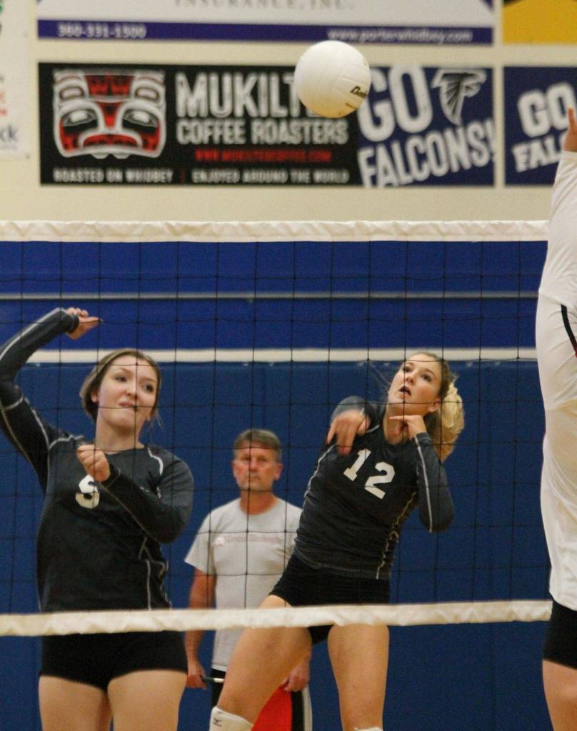 Emma Leggett (12) attacks from the back row.(Photo by Jim Waller/South Whidbey Record)