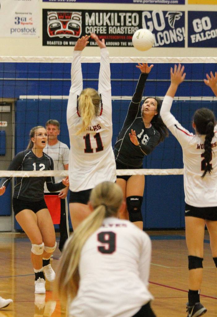 Megan Leonard (16) splits a Coupeville block.(Photo by Jim Waller/South Whidbey Record)