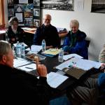 South Whidbey Historical Society volunteer board members include president Bill Haroldson, far right, Bruce Towne, Betty Discher, Bob Waterman, and Joan Handy. Seated on the other side are Tom Nack and Gary Gabelein. (Photo provided)