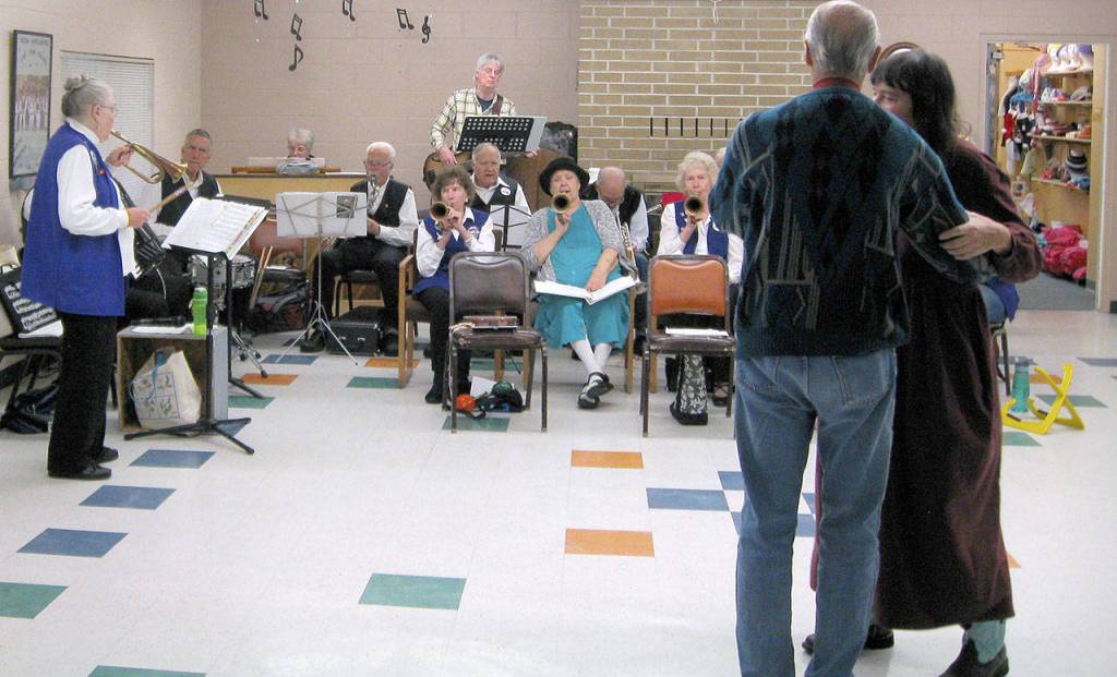 Photo by Dave Felice / Whidbey News Group                                A couple dances to the music of the Fun Band at Island Senior Resources.