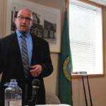 Glen Carpenter, an expert in use of force by law enforcement officers, delivers his report on a Langley police officer at a city council meeting earlier this year.