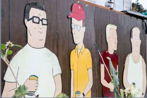 Kelly Hatley, 63, proudly displays characters from King of the Hill in Freeland on Whidbey Island. (Kevin Clark / The Herald)