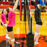 South Whidbeys Emma Hodson, right, rises in an attempt to block Emma Smiths tip.