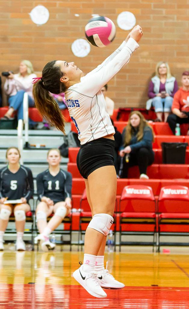 Angelina Wilson saves a deep ball in the Coupeville match.(Photo by John Fisken)