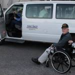 Photo by Patricia Guthrie/Whidbey News Group                                Clay Canfield helps Terri Marie Desrosiers into the Island Transit RideLink van that transports veterans to medical appointments.