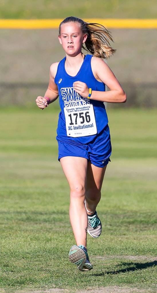 South Whidbeys Parker Forsyth runs to third place overall, good for second among Cougars. (Photo by John Fisken)