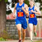 South Whidbeys Michael Cepowski leads teammate Callahan Yale partway through Saturdays race. Yale went on to finish second and Cepowski third. (Photo by John Fisken)