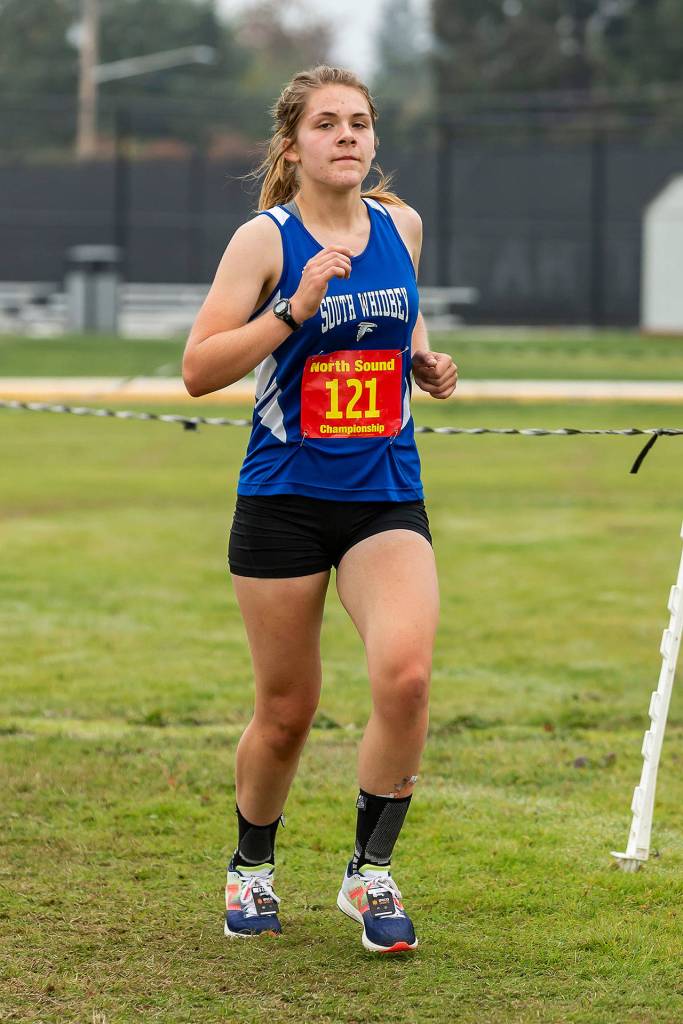 Grace Huffman finishes third for South Whidbey and 10th overall at the league meet.(Photo by John Fisken)