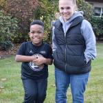 KD Carpenter and Lolly Titherington stand outside the Oak Harbor Fire Station, where Titherington works. They are part of an organization that helped declare October as Dwarfism Awareness and Acceptance month in Washington state. Photo by Laura Guido/Whidbey News-Times
