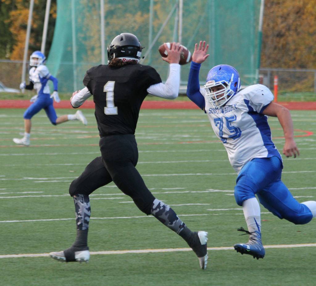 South Whidbeys Kobe Balora chases Meridians Dawson Logan.(Photo by Jim Waller/South Whidbey Record)