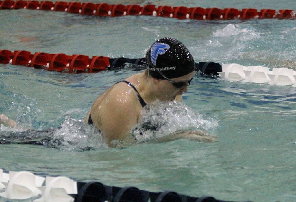 Sarah Zundel swims the breaststroke leg of the medley relay Saturday.(Photo by Jim Waller/South Whidbey Record)