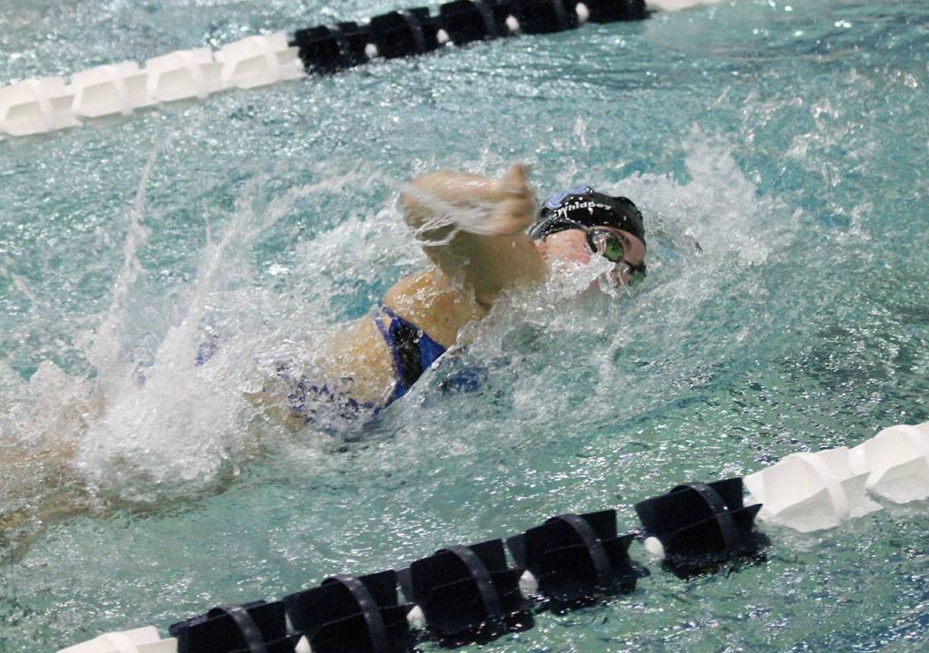 Anna Bennett swims the anchor leg for the Falcon 200-yard medley relay. (Photo by Jim Waller/South Whidbey Record)