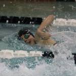 Ashley Lynch swims to fourth place in the 200 freestyle at the district meet Saturday. Her time earned the South Whidbey junior a berth in the state meet.(Photo by Jim Waller/South Whidbey Record)