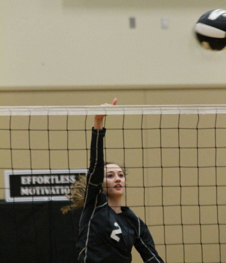 Allysa Ludtke watches as her hit flies over the net.(Photo by Jim Waller/South Whidbey Record)
