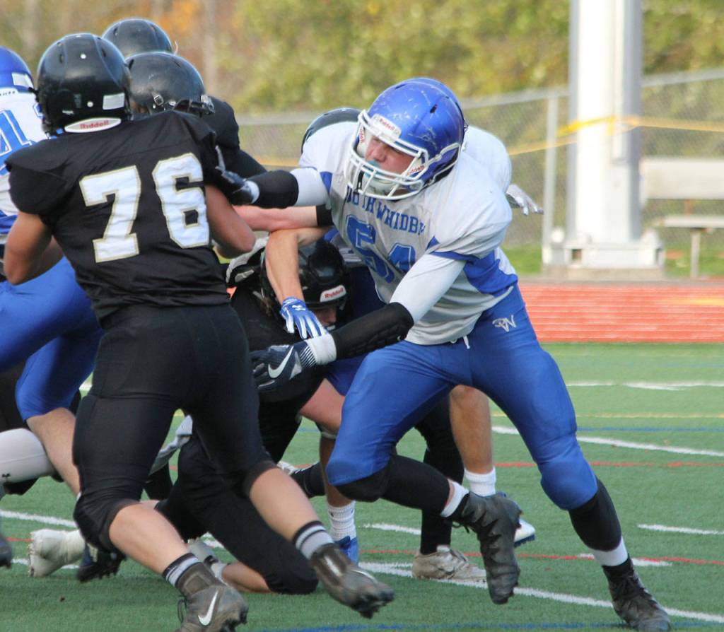 Wyatt De Mers (54) received first-team honors as both an offensive and defensive lineman. (Photo by Jim Waller/South Whidbey Record)