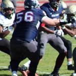 Chase Barthlett (56) blocks during a football game this fall. (Photo courtesy of College of the Siskiyous Athletics)