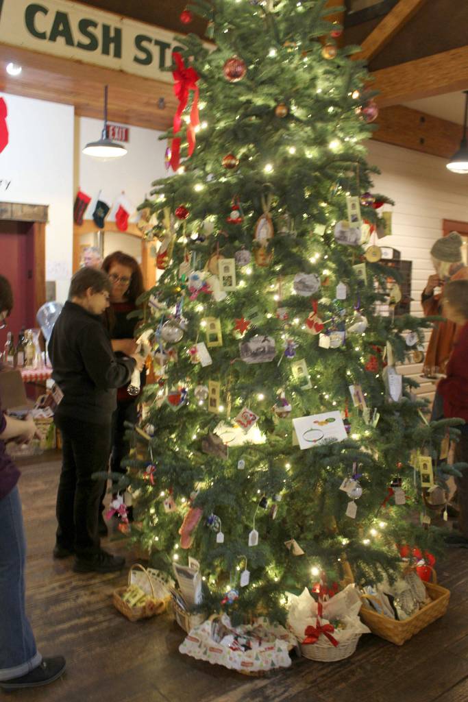 The Giving Tree was decorated Thursday evening at the Bayview Cash Store by more than 20 nonprofit organizations.