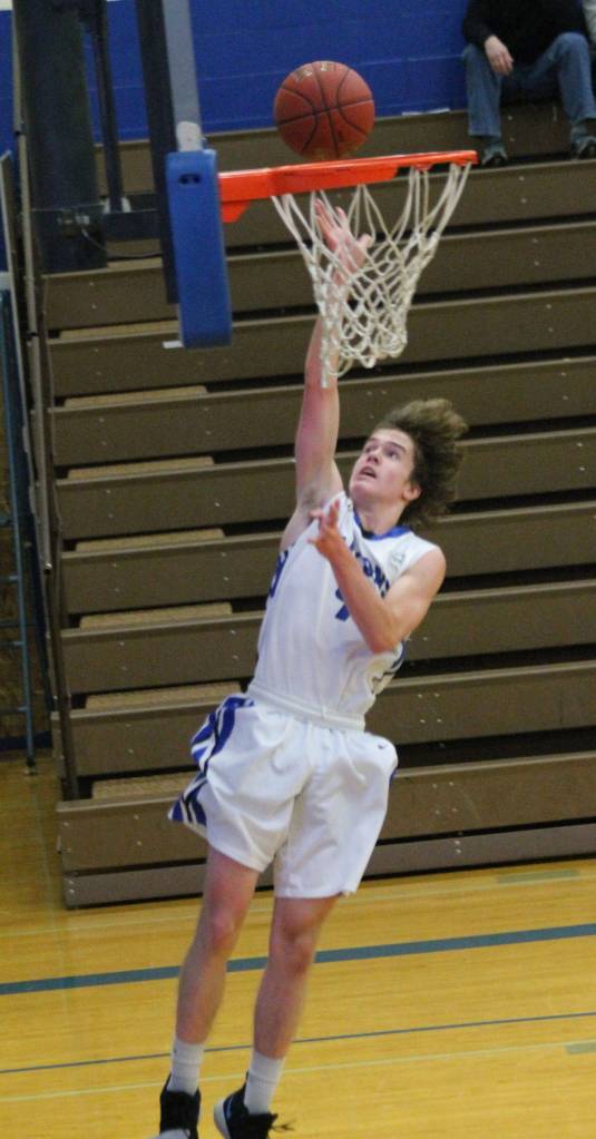 Nick Young scores off a steal in the season opener.(Photo by Jim Waller/South Whidbey Record)