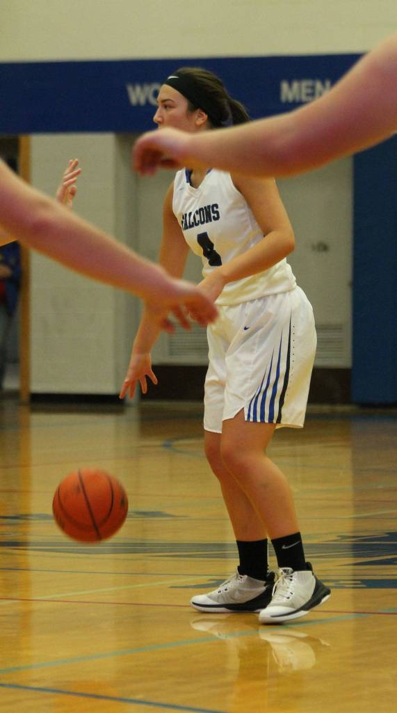 Farriss Jokinen looks through a sea of hands.(Photo by Jim Waller/South Whidbey Record)