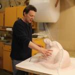 Randy Hudson explains the process of building a mold and bronzing a sculpture.