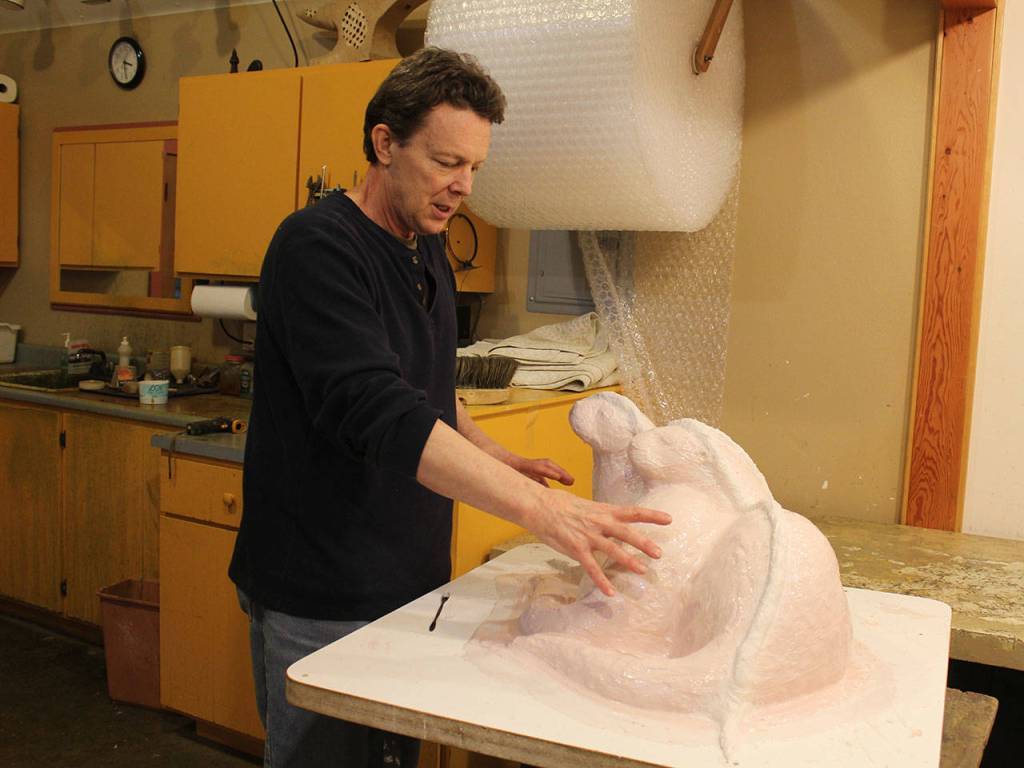 Randy Hudson explains the process of building a mold and bronzing a sculpture.