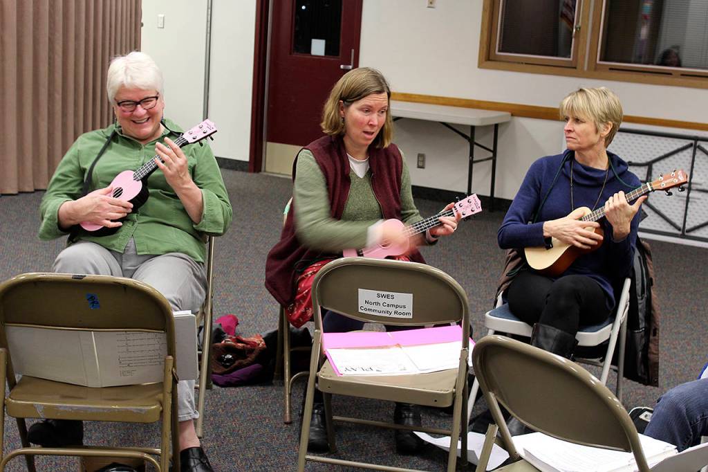 Rachel Kizer, left, Sarah Gillette and Valerie Brown talk about the challenges and rewards of learning to play the ukulele.