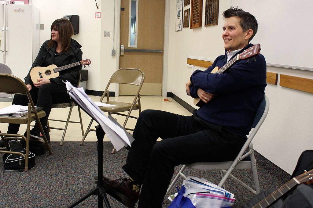 Quinn Fitzpatrick leads a Guitars in the Classroom session with staff from South Whidbey Elementary School.