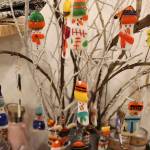 David Brown enjoys making these tiny fused glass ornaments to sell in his daughters shop, Flying Bear.